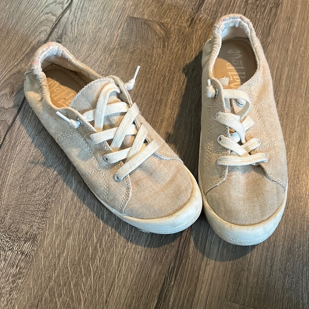 Tan slip on shoes